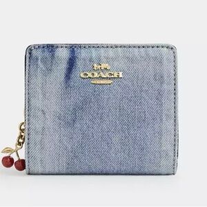 Coach Snap Wallet
In Loved Denim With Charm
